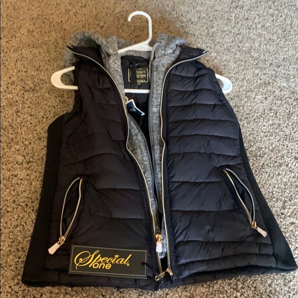A black and white vest
